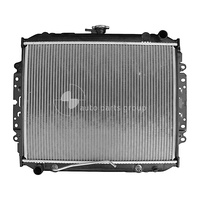 RADIATOR TF RODEO 2.6 LITRE 4 CYL 4ZE1 1988 TO 12/1997 SIDEBANDS 635mm CENTRE TO CENTRE CHECK POSITION OF TOP OUTLET