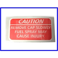 DECAL WARNING FUEL SPRAY INSIDE FUEL DOOR VR VS VT VX VY